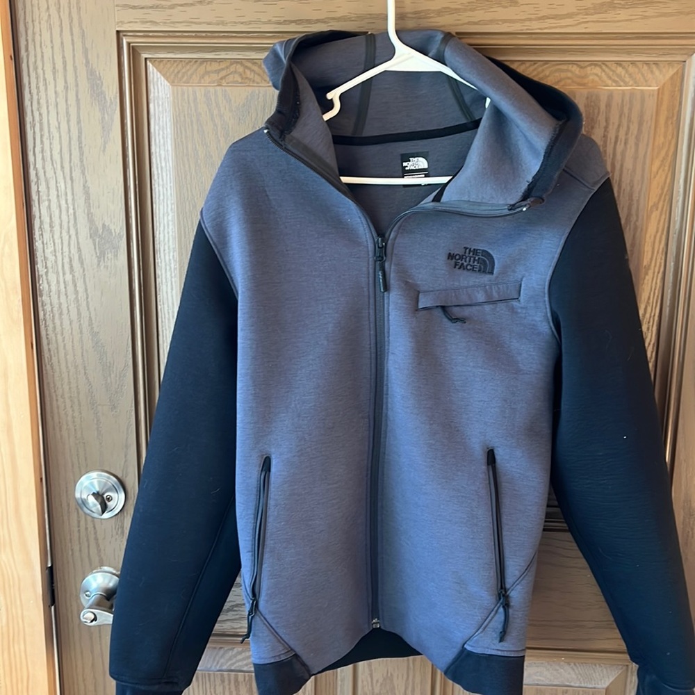 The North Face men’s small black and gray zip up. Heavier weight.